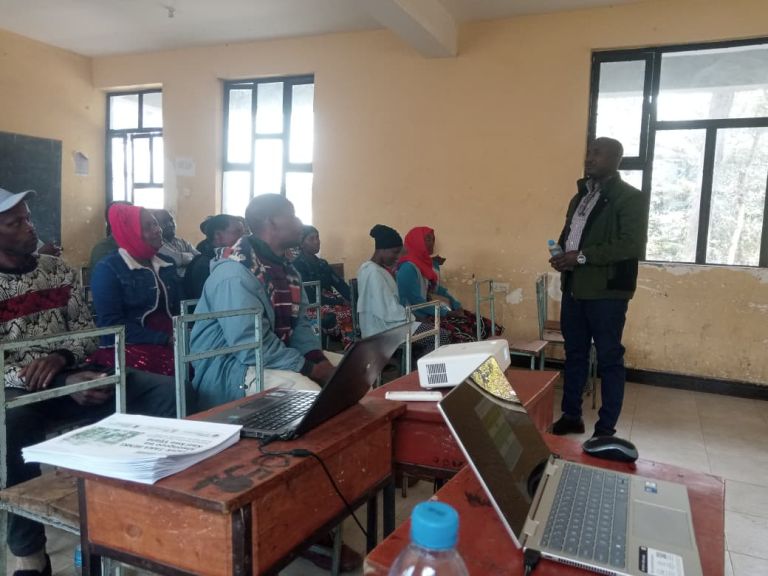 conducting joint training to small scale farmers on safe use of pesticides at ikiding'a village in Arumeru District